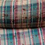 bed bug squashed dead with blood on pillow
